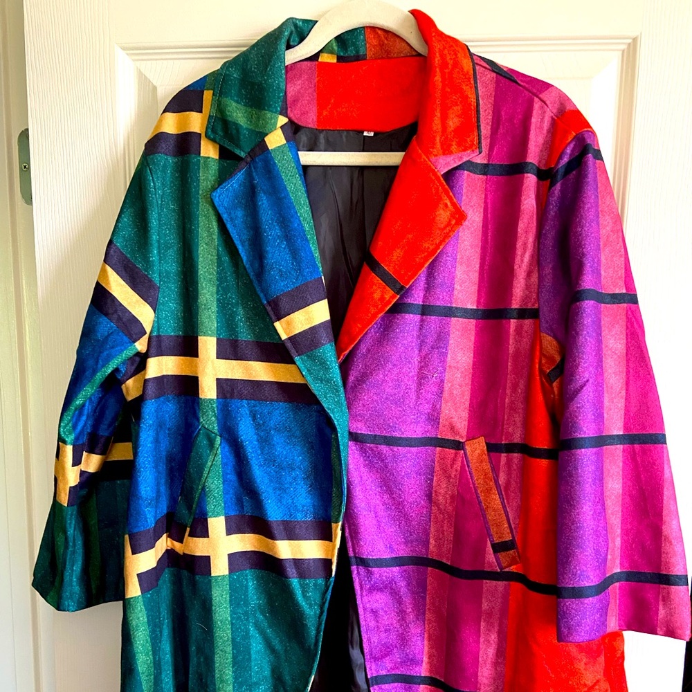 Multi light weight jacket. 100% polyester and fully lined. New never been worn